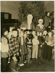 Children with Mr. and Mrs. Claus at the Independence County Library's annual Christmas Story Hour