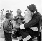 Young boys talking to Santa