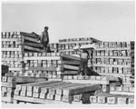Stacking railroad ties near North Little Rock